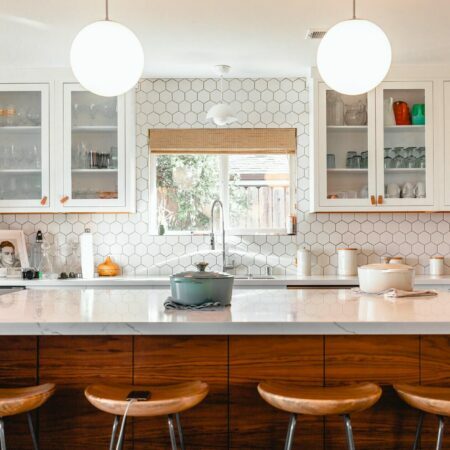 a kitchen with white cabinets