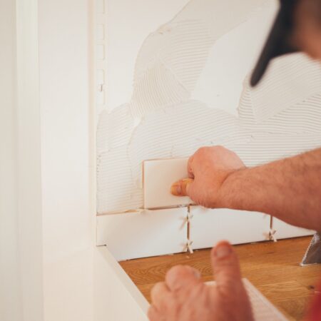 a person drawing on a white board