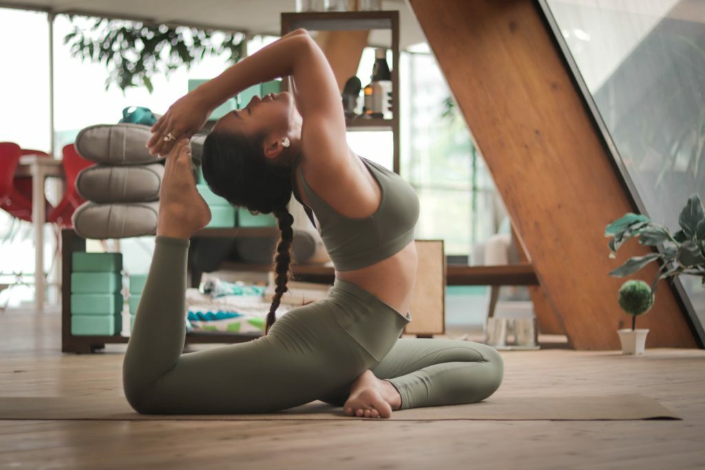 a woman doing a handstand