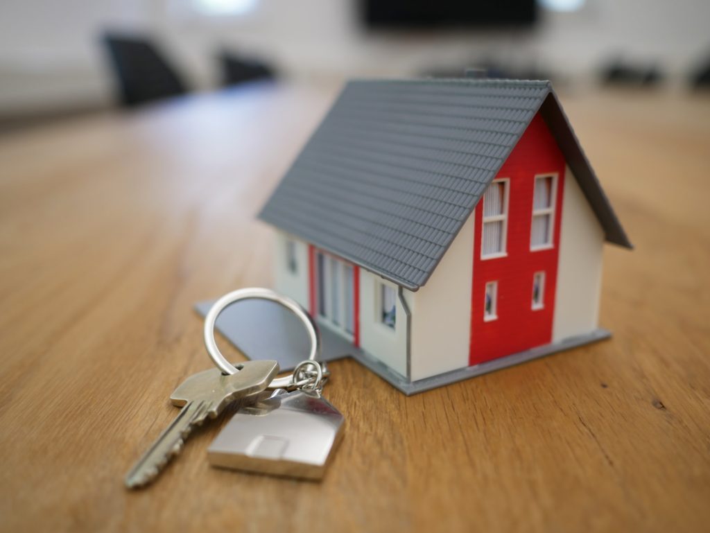 a key chain and a house