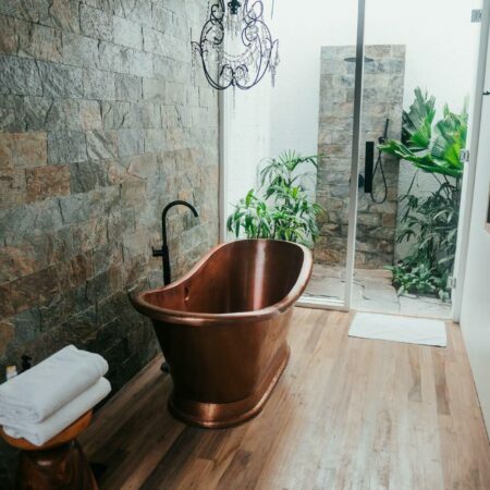 a large brown tub in a bathroom