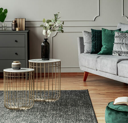 a living room with a white couch and a coffee table