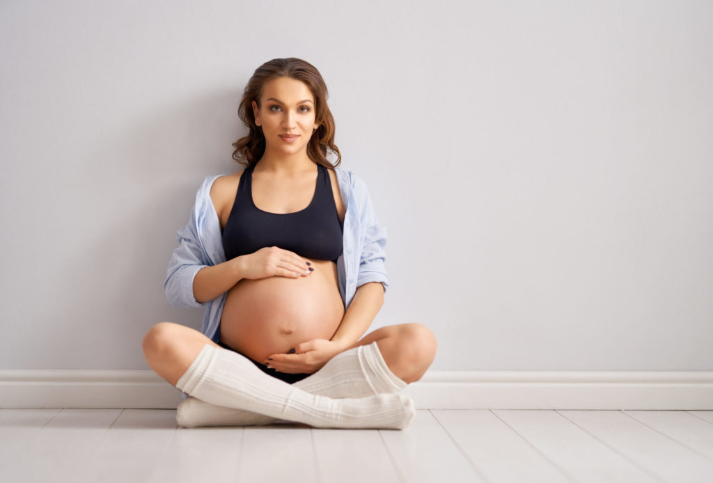 a woman sitting on the floor