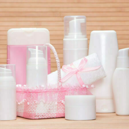 a group of pink and white containers